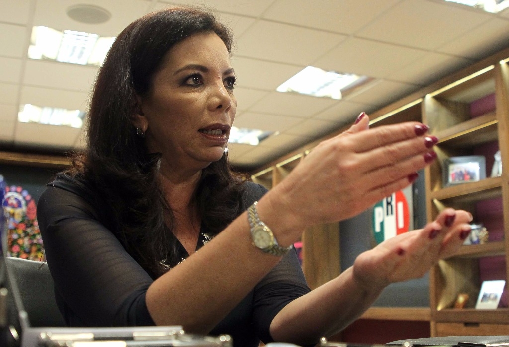 Por cuota de género